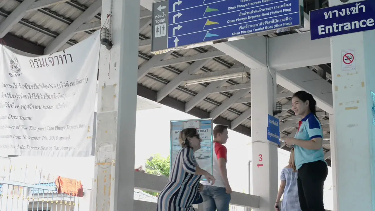 Chao Phraya Boat Station Staff Greeting Passengers