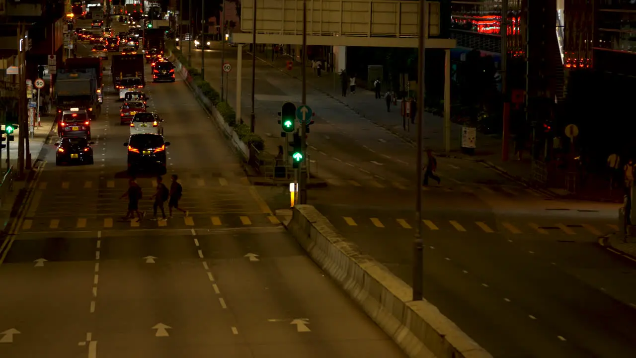 Traffic On a Busy Street At Night in Hong Kong