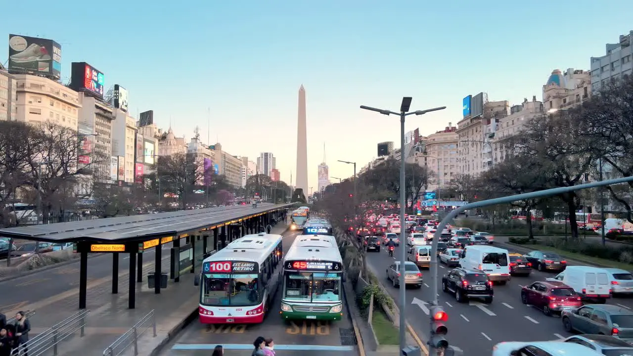 Buses pass through bus lanes during rush hour traffic along July 9 Avenue