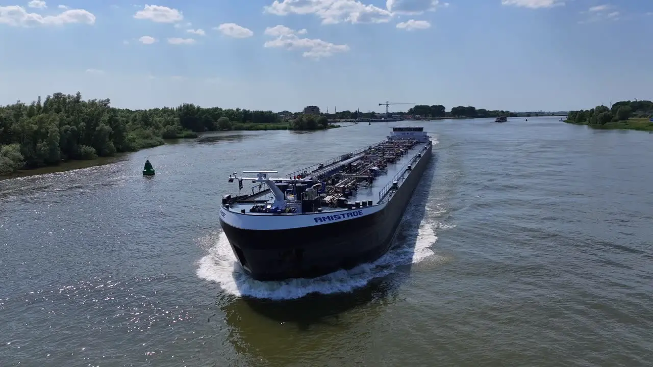 Aerial view of industrial ship in the water carrying equipment