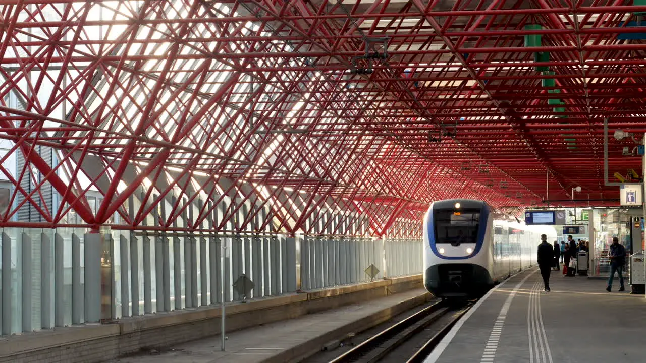 A sprinter arriving at Almere railway station