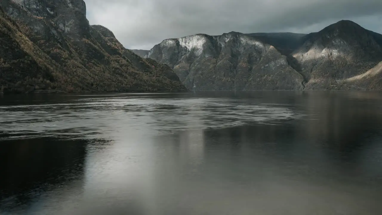 View to Aurladsfjord in Western Norway with strong current in the foreground