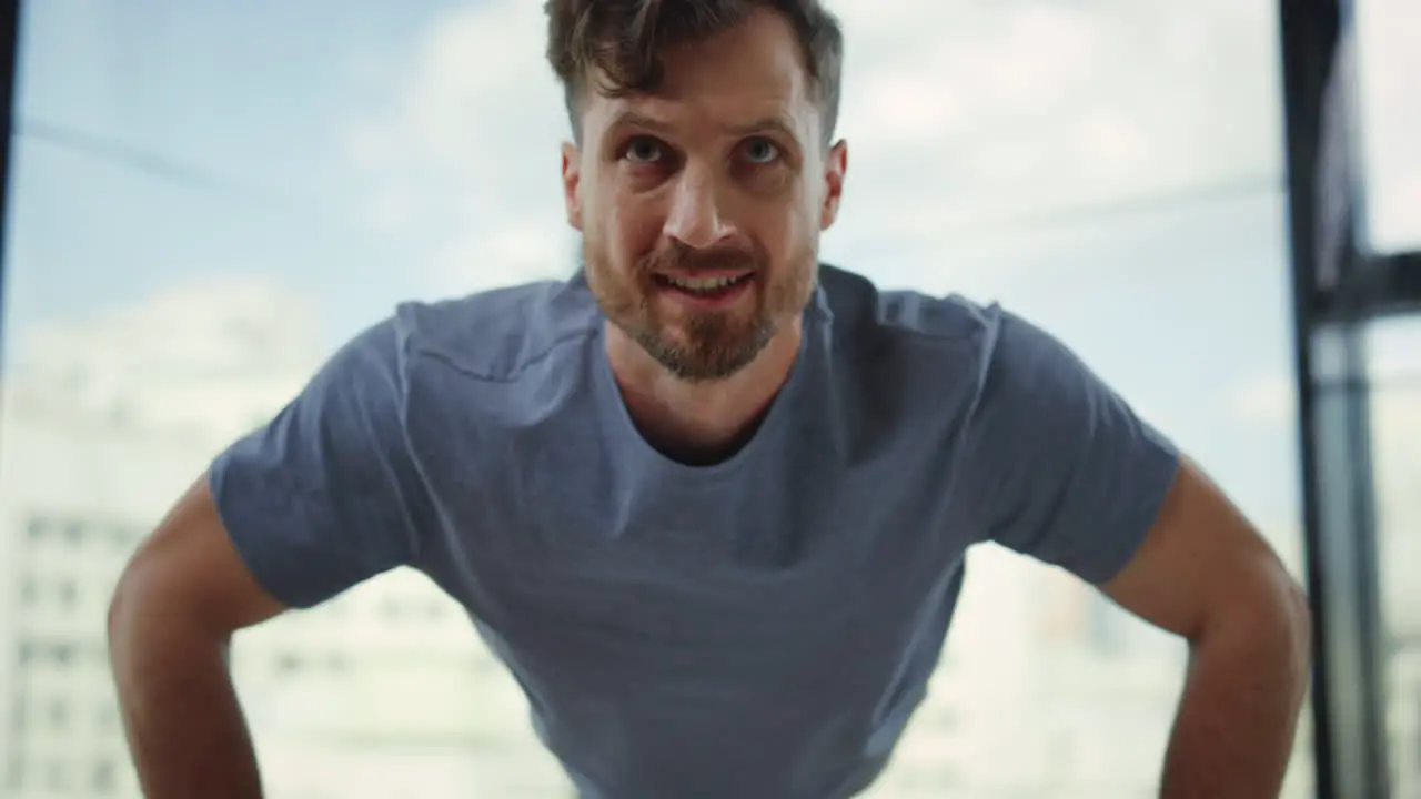 Confident man doing workout indoors