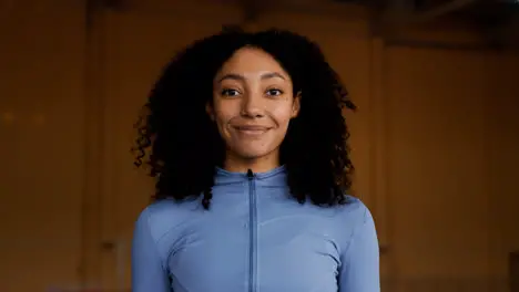 Young woman in running track