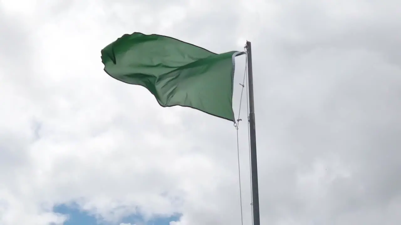 Slow motion of Triangular green flag