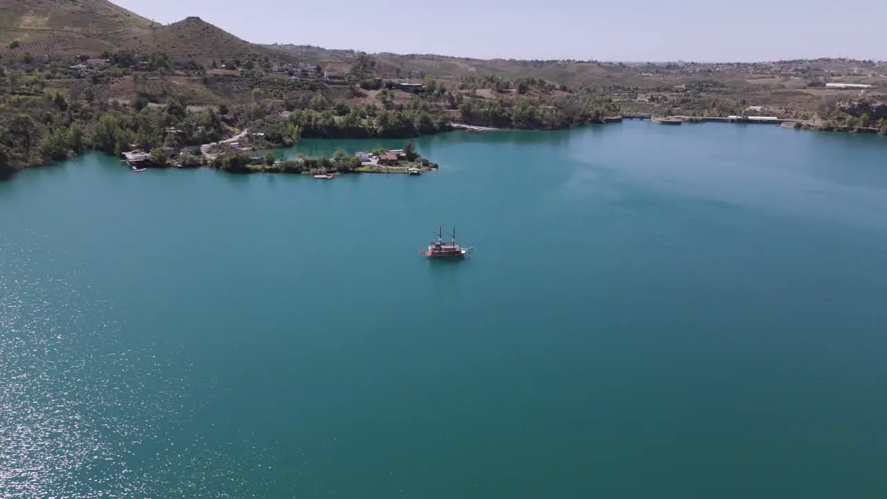 Vista Of Alanya Pirate Boat Across Green Lake In Oymapinar Dam Area Antalya Turkey