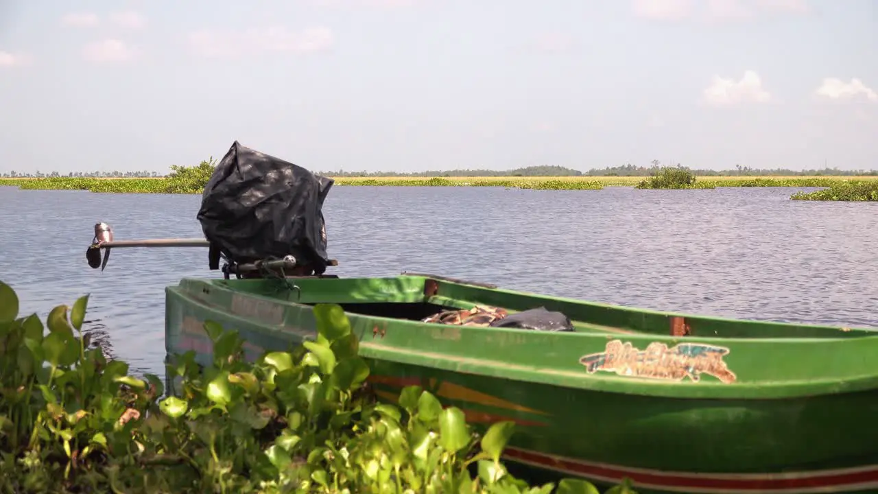 Medium Shot of Green Boat in Water