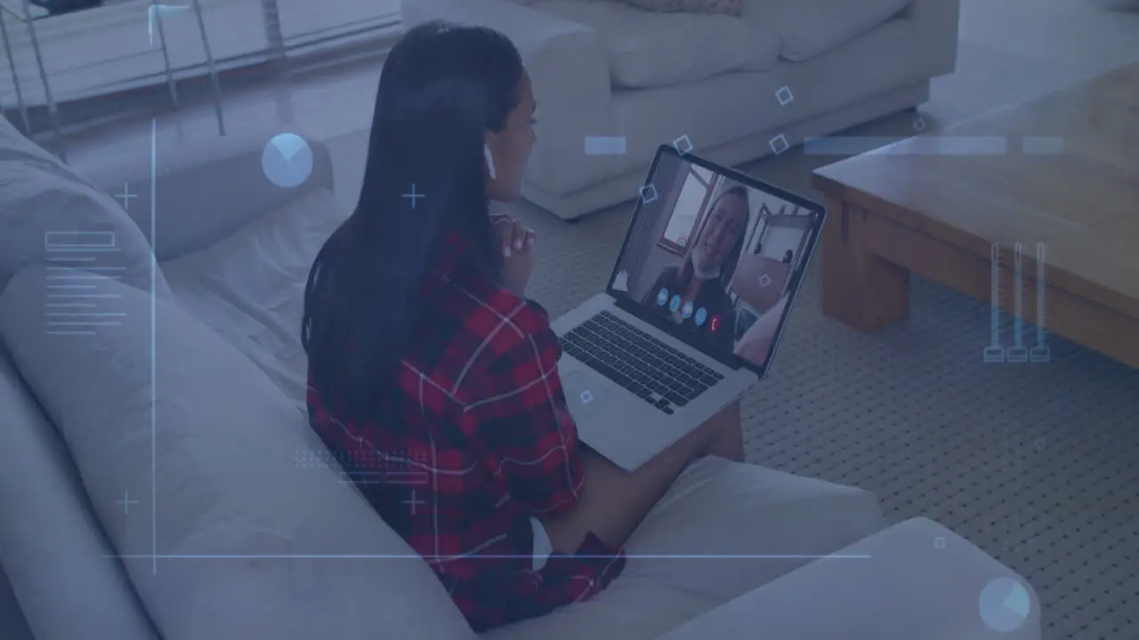 Animation of digital screen with diverse data over biracial woman having video call on laptop