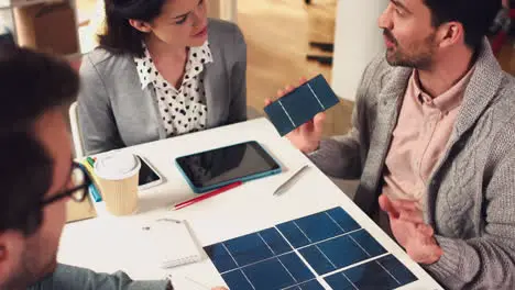 Solar panels business people