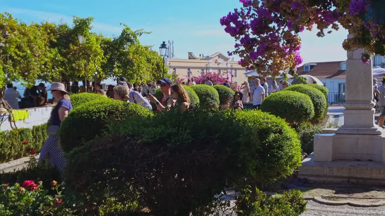 Tourists and visitors enjoying the sights of the historic destination of Lisbon