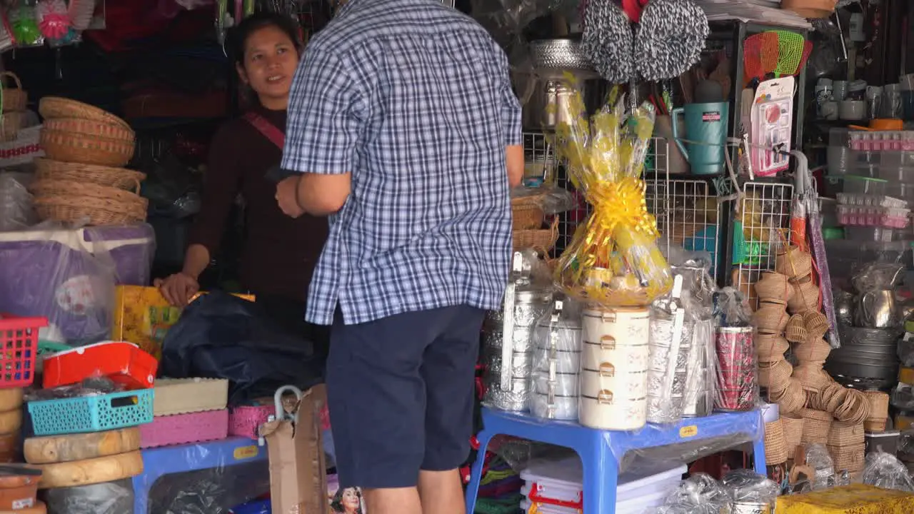 Tourist Man Haggling at the Local Market