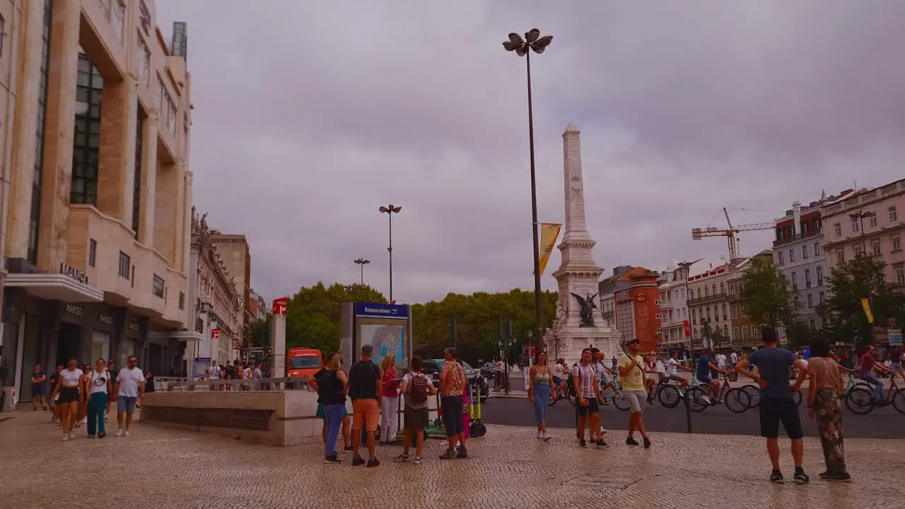 Visitors and locals walking around the beautiful and historic city of Lisbon