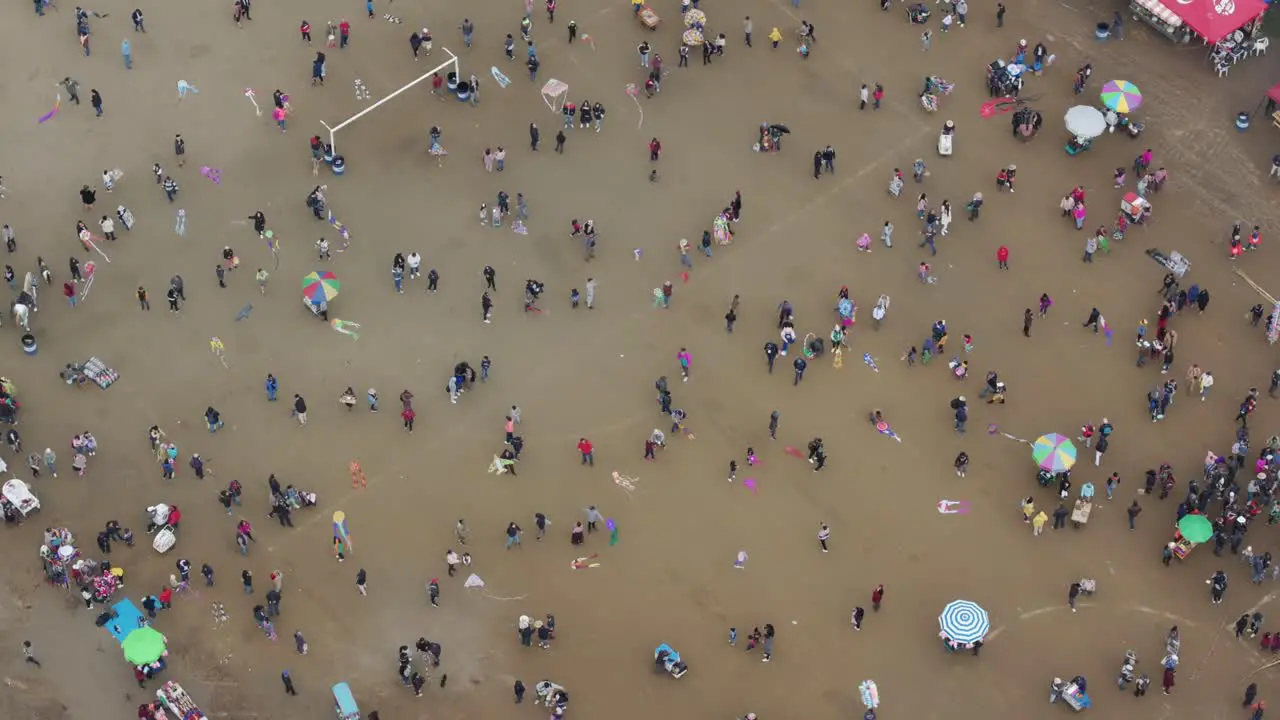 Aerial view of people flying small kites at Sumpango Kite Festival guatemala