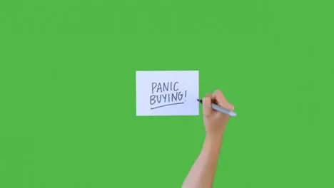 Woman Writing Panic Buying on Paper with Green Screen