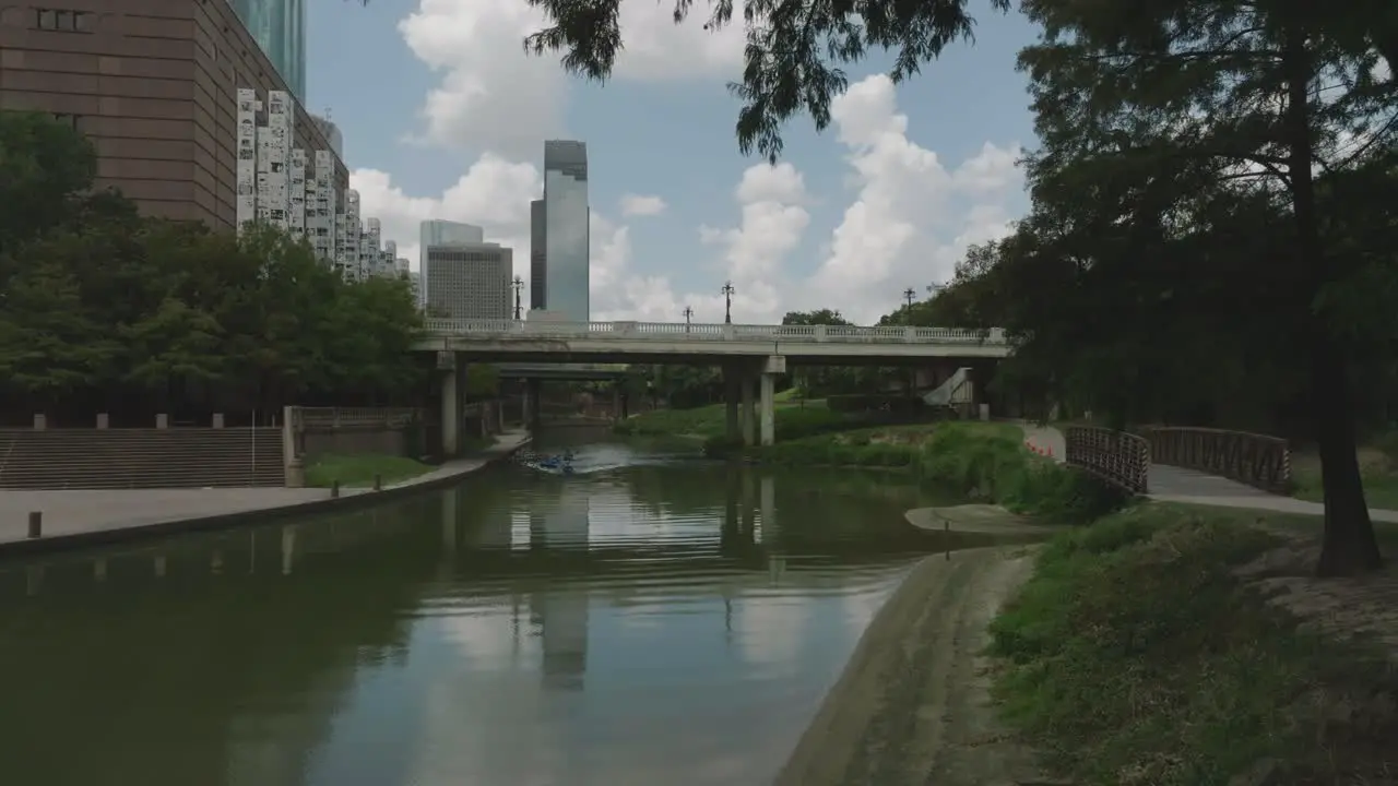 Aerial drone view of kayakers with kayak instructor paddling down Buffalo Bayou in downtown Houston Texas