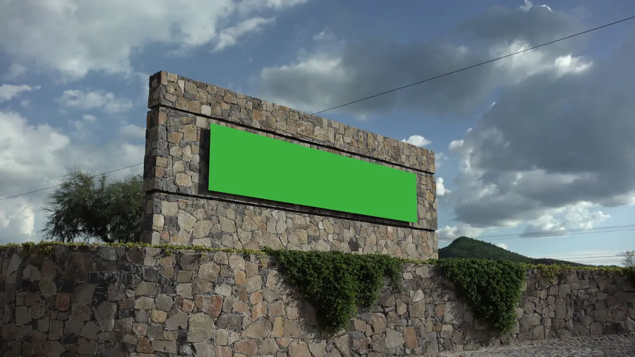 Green screen billboard rustic construction wide shot clouds background