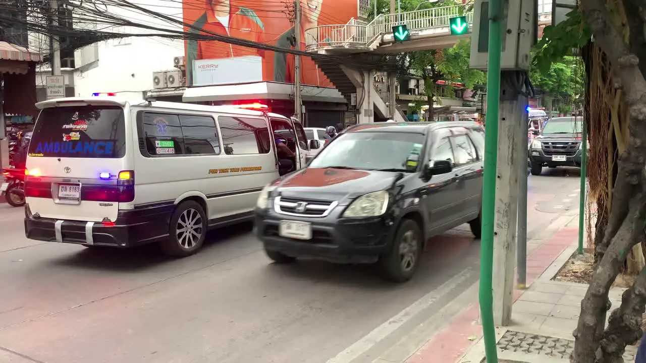 An Ambulance Arrived At The Vicinity Of A Street Accident In Bangsue Bangkok Thailand wide shot