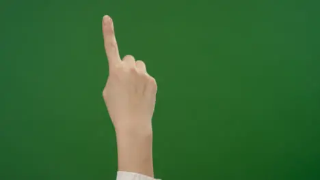 Female Finger making scrolling gestures on green screen