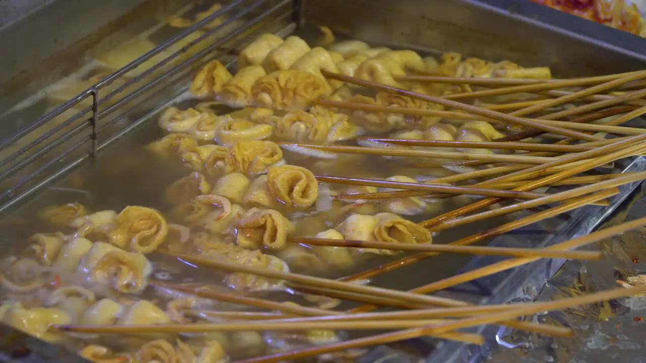 many plain not spicy oden in boiling soup at street market in Seoul South Korea