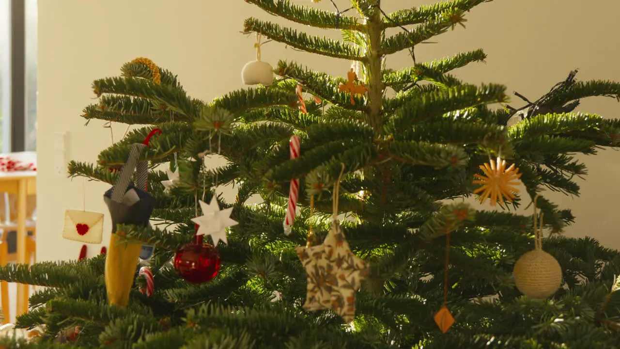 Elegantly adorned Christmas tree with Scandinavian-style decorations