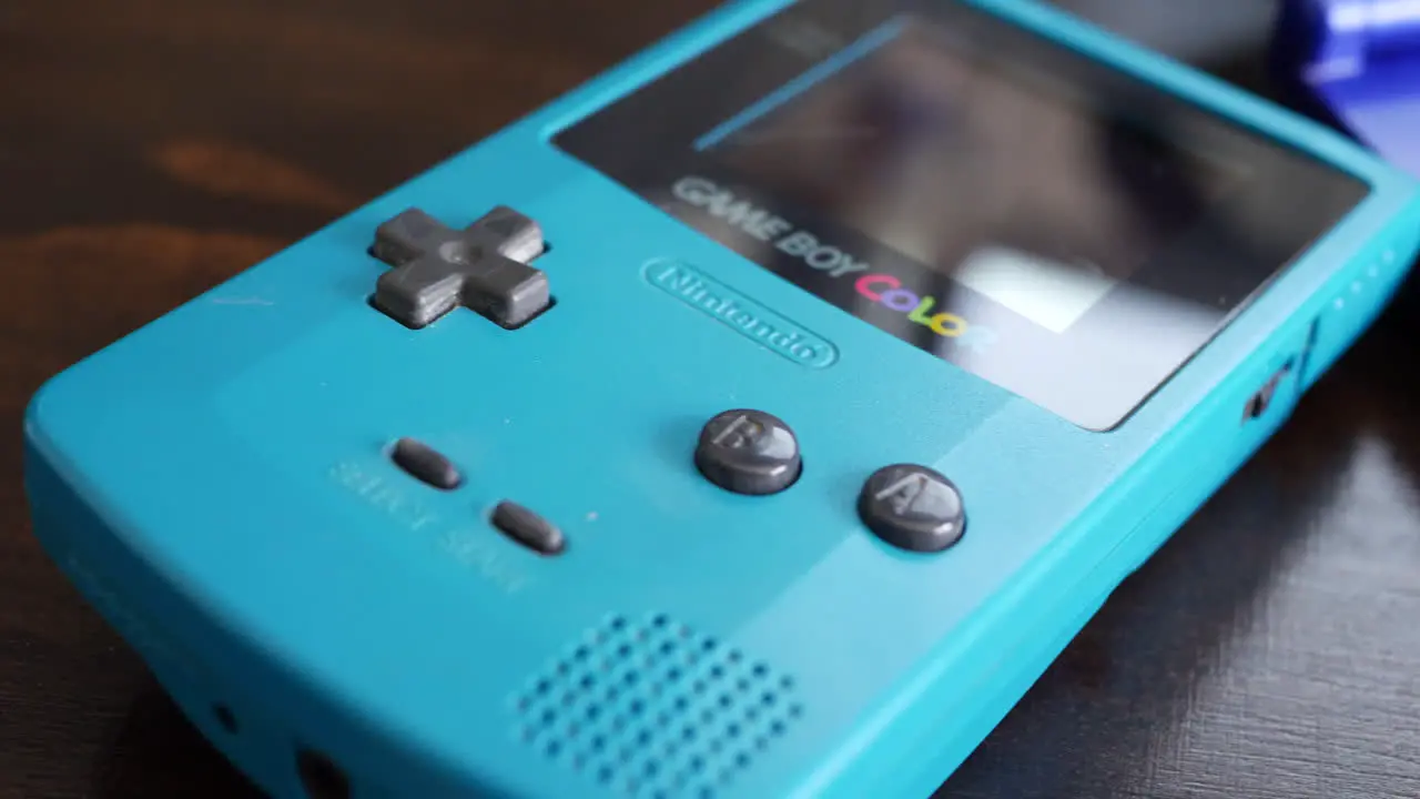 A classic vintage retro Nintendo Gameboy Color and Advance SP videogame handheld device