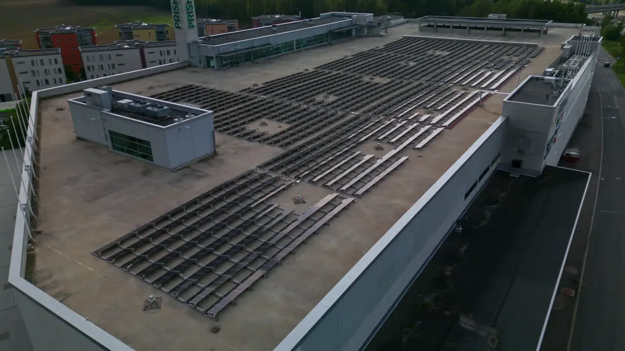 A large array of solar panels on top of a European hypermarket in Helsinki Finland