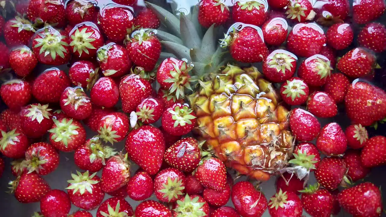 Fresh washed fruit slowly turns in water healthy choice concept