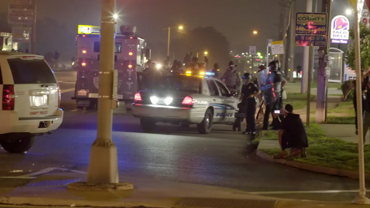 Military style police vehicles invade Ferguson Missouri during rioting there 1