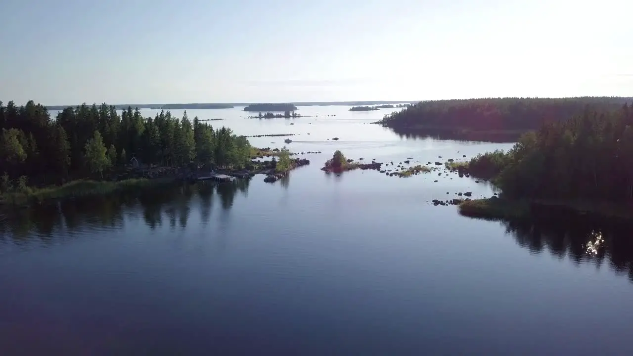 Aerial coast guard boat meeting jet in beautiful European archipelago