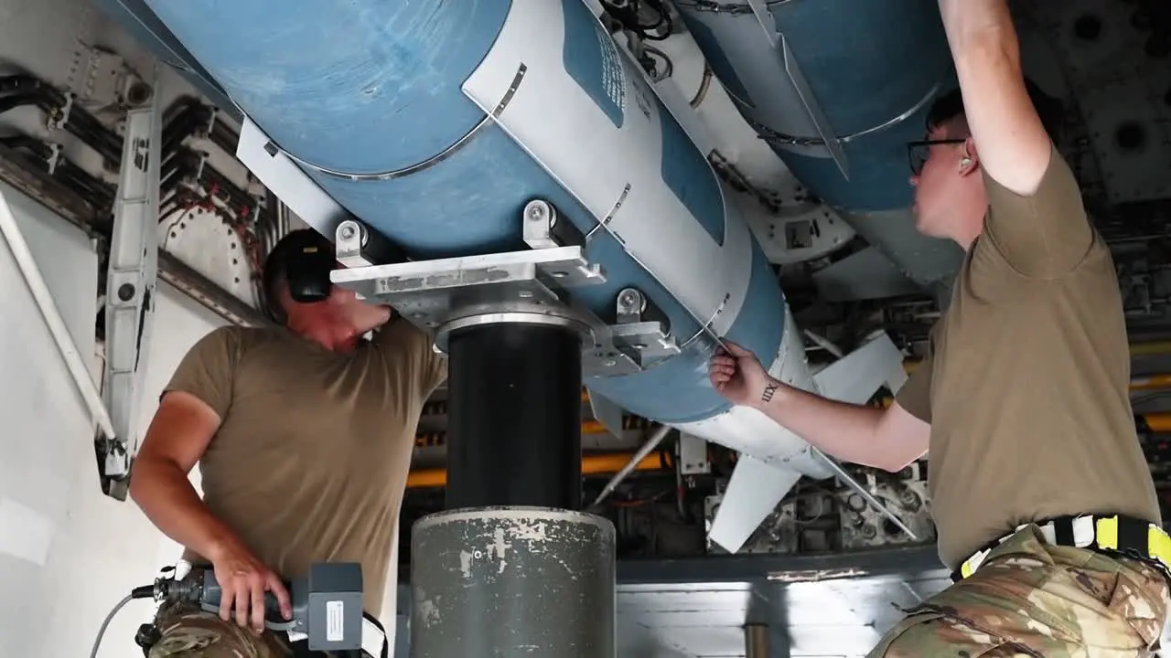 Missiles Are Loaded Onto An Aircraft By Members Of The A4 Air Force Global Strike Command 2019