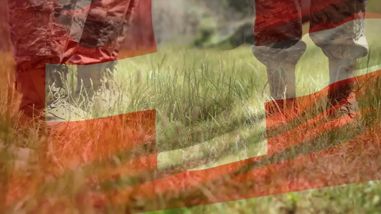 Animation of flag of switzerland waving over low section of soldiers