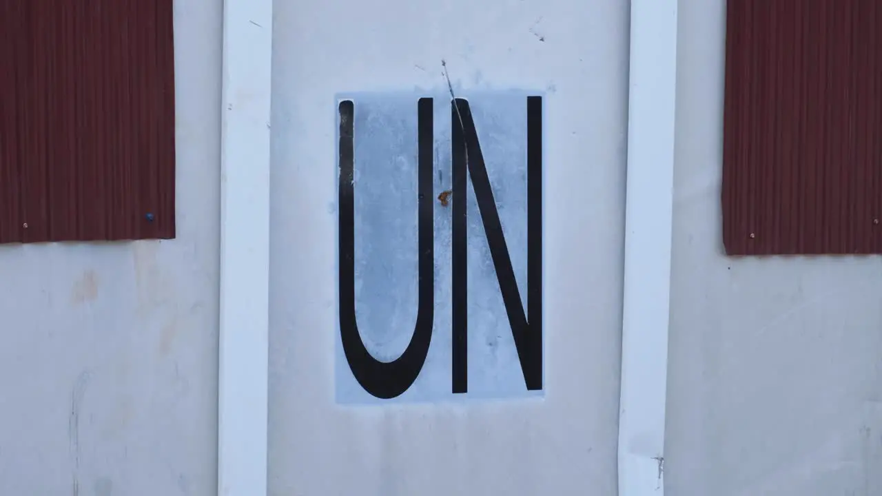 Close up of United Nations sprayed on the side of a shipping container in the capital city of East Timor Southeast Asia