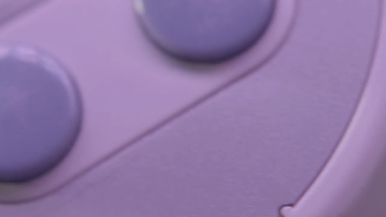 Buttons on Vintage Super Nintendo Controller in Purple Light SLIDE LEFT