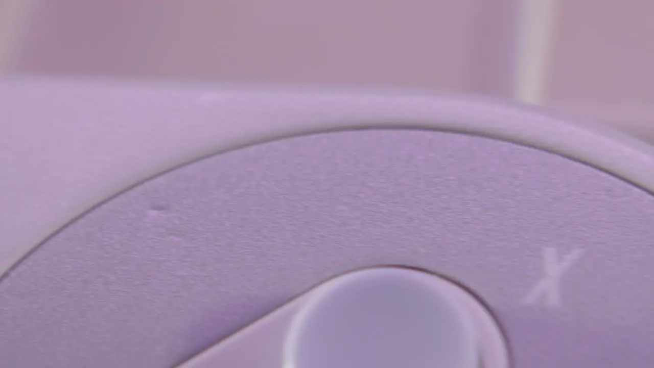 Logo on Vintage Super Nintendo Controller in Purple Light SLIDE RIGHT