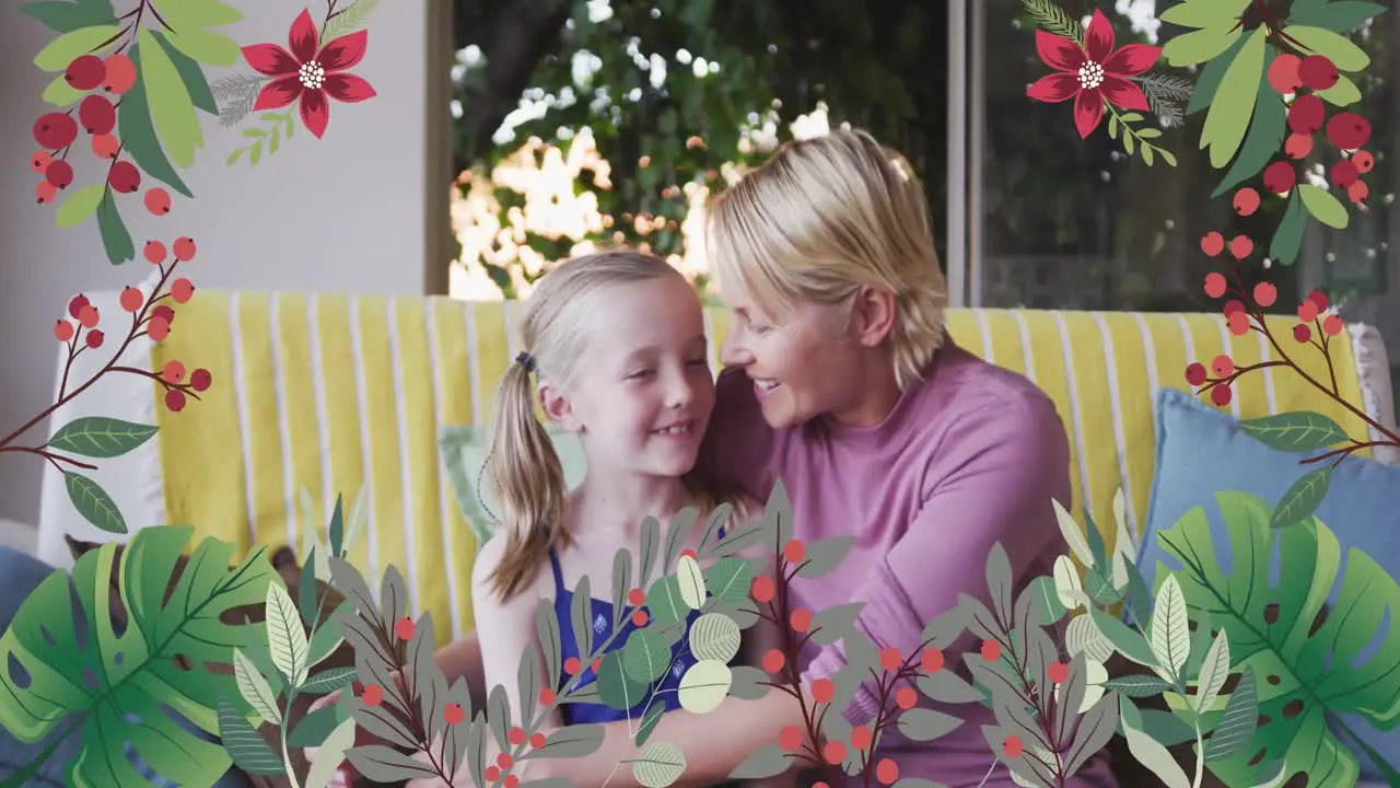 Animation of flowers over happy caucasian mother embracing her daughter