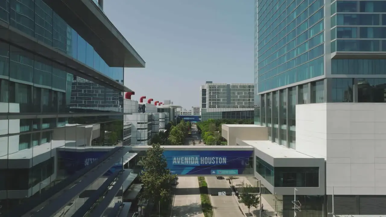 Aerial drone view of Avenida Houston with George R Brown Convention Center Discovery Green and major Hotels in Texas’ largest convention and entertainment area located in downtown Houston Texas