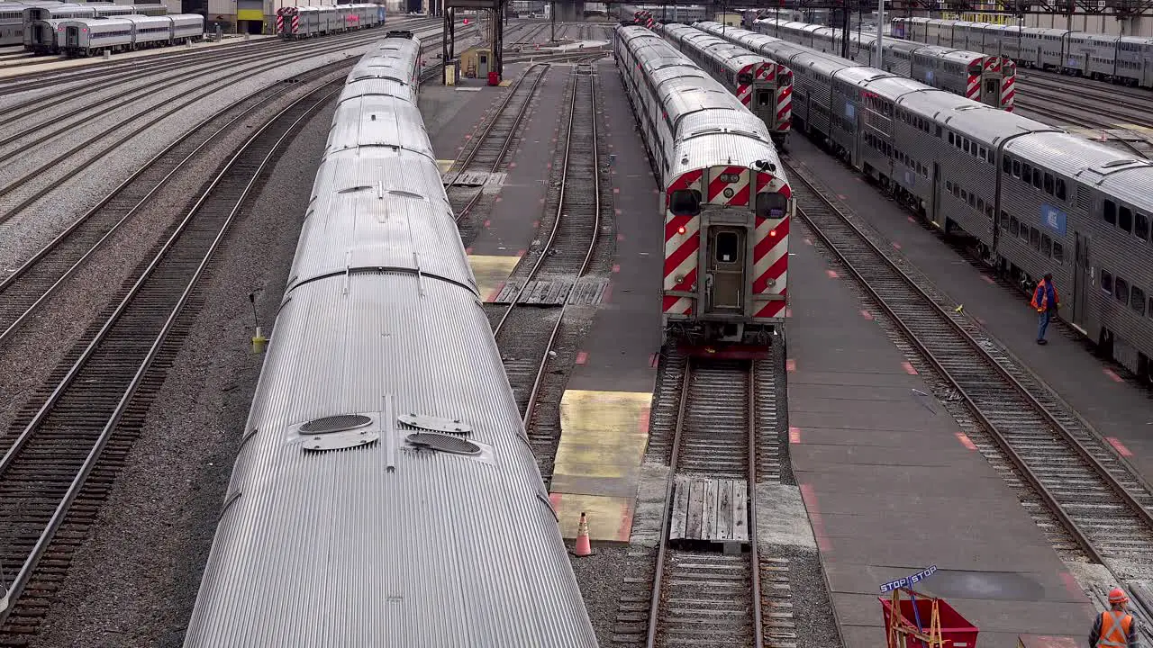 railroad workers and trains in a rail yard 4k