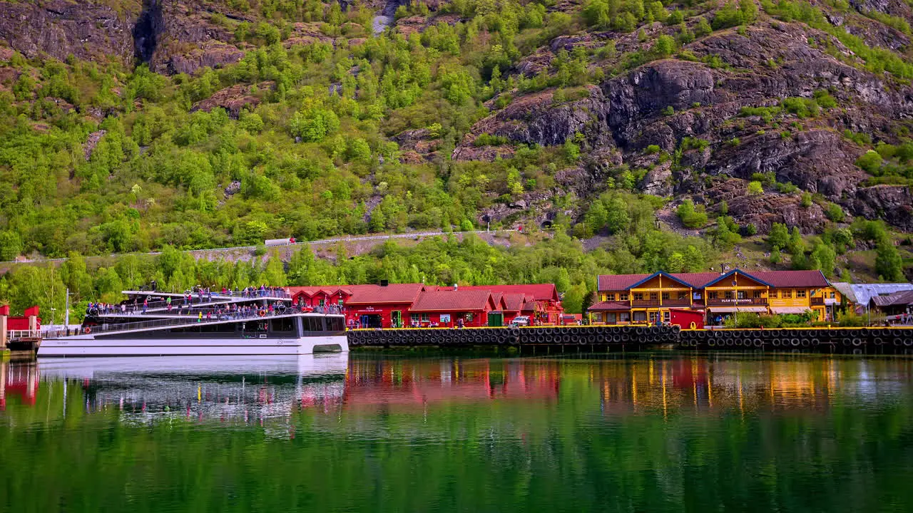 People boarding modern ferry that leaves in Norway fusion time lapse