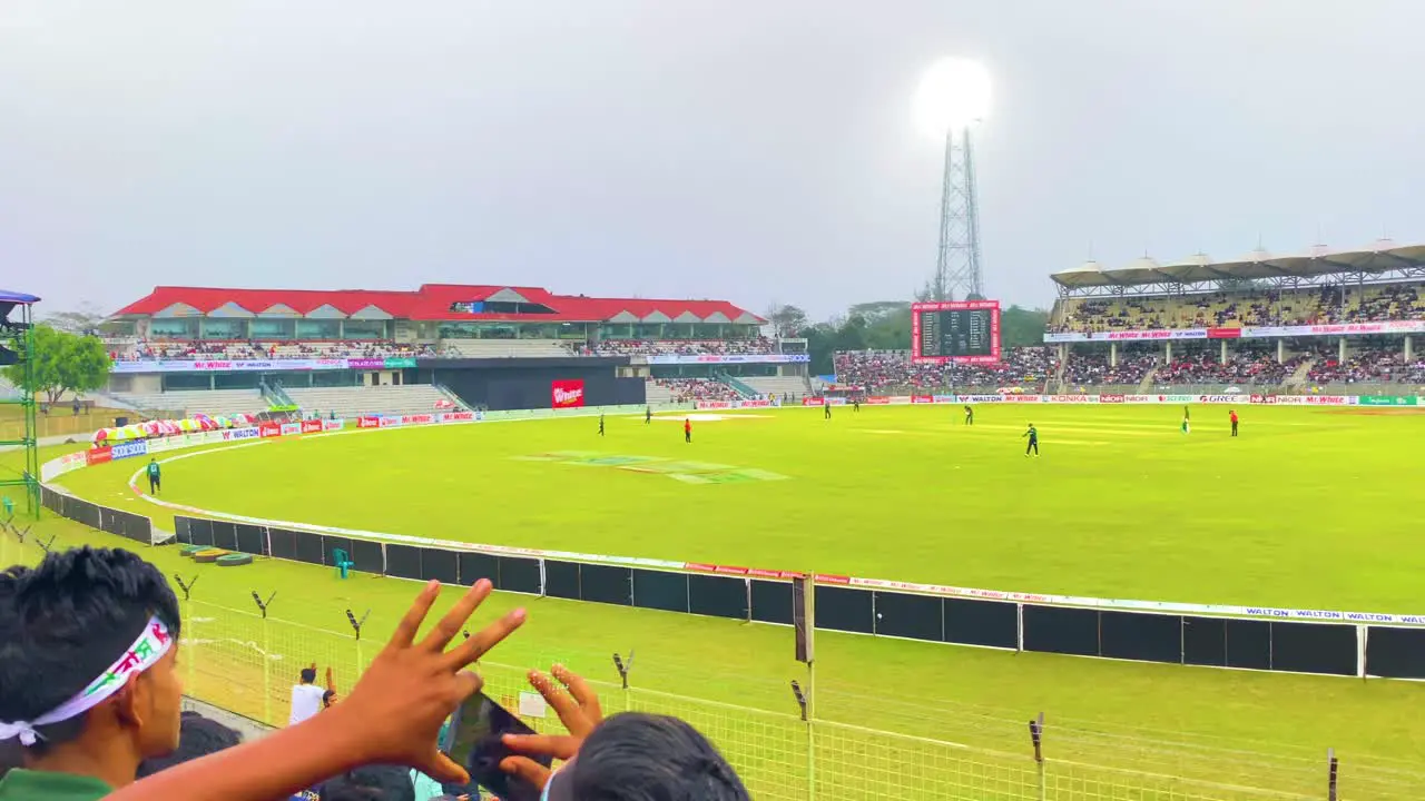 Handheld Pan of Sylhet International Cricket Stadium and Supporters in the Stands during an Ireland vs Bangladesh Game