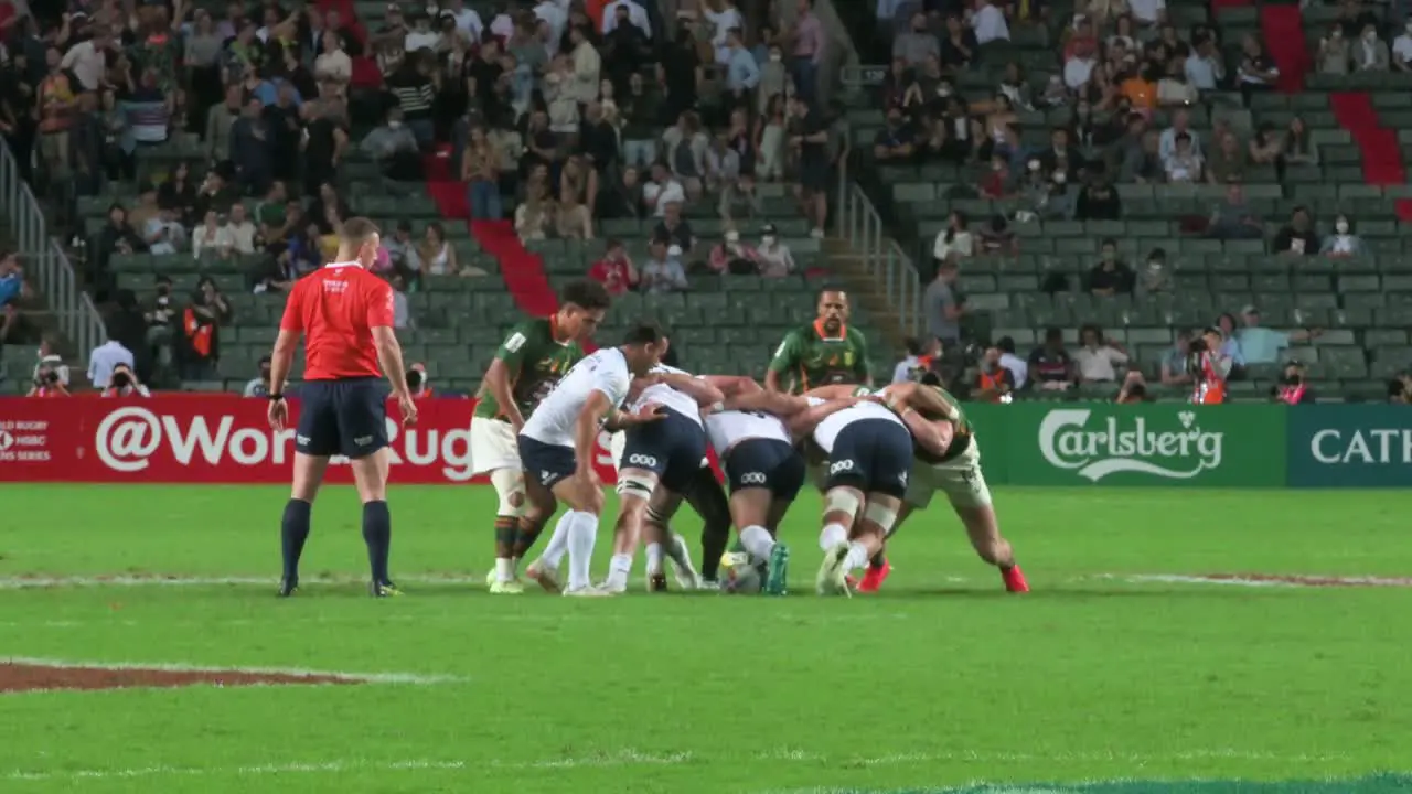 Uruguay and South Africa rugby teams and players in a scrum during the Hong Kong Seven rugby tournament