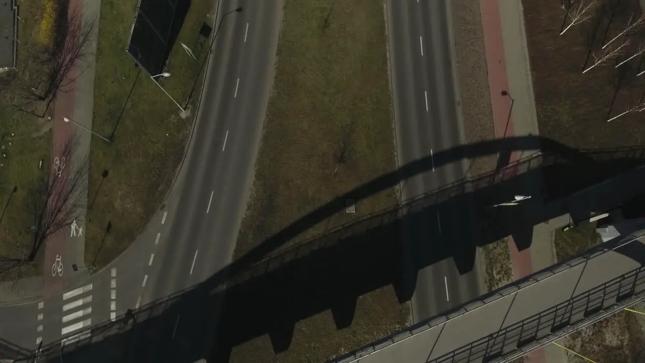 An asphalt road in the middle of a large city during summer in Poland