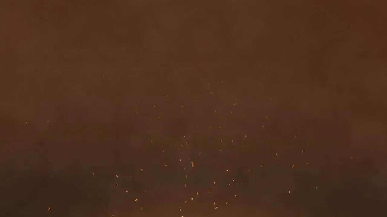 Animation of light sparks over fireworks exploding against brown background with copy space