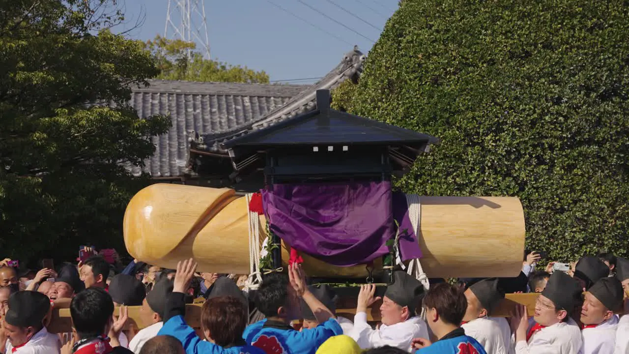 Honensai at Tagata Shrine in Komaki Japanese Men Celebrate Carrying Wooden Phallus