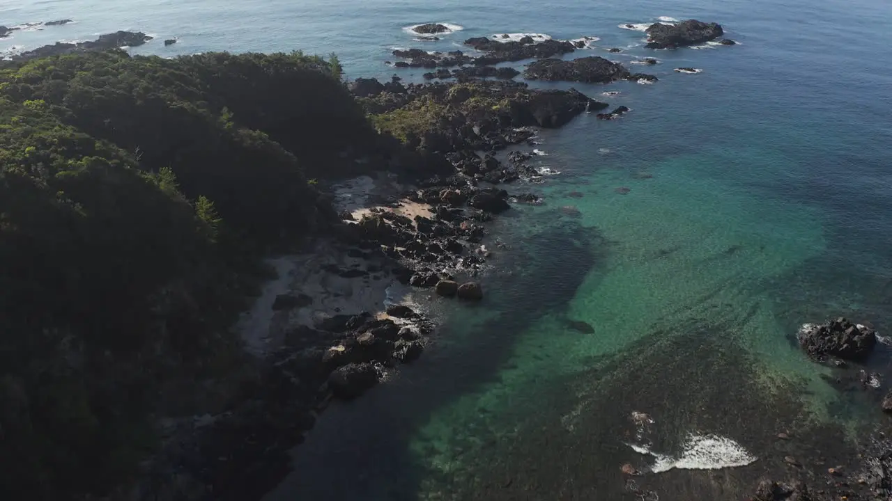 Yakushima Coastline at Sunrise Aerial flying towards Reef in Japan