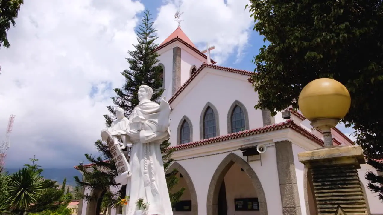 Historical landmark of Roman Catholic Motael Church with religious statue in capital city of Dili Timor-Leste Southeast Asia