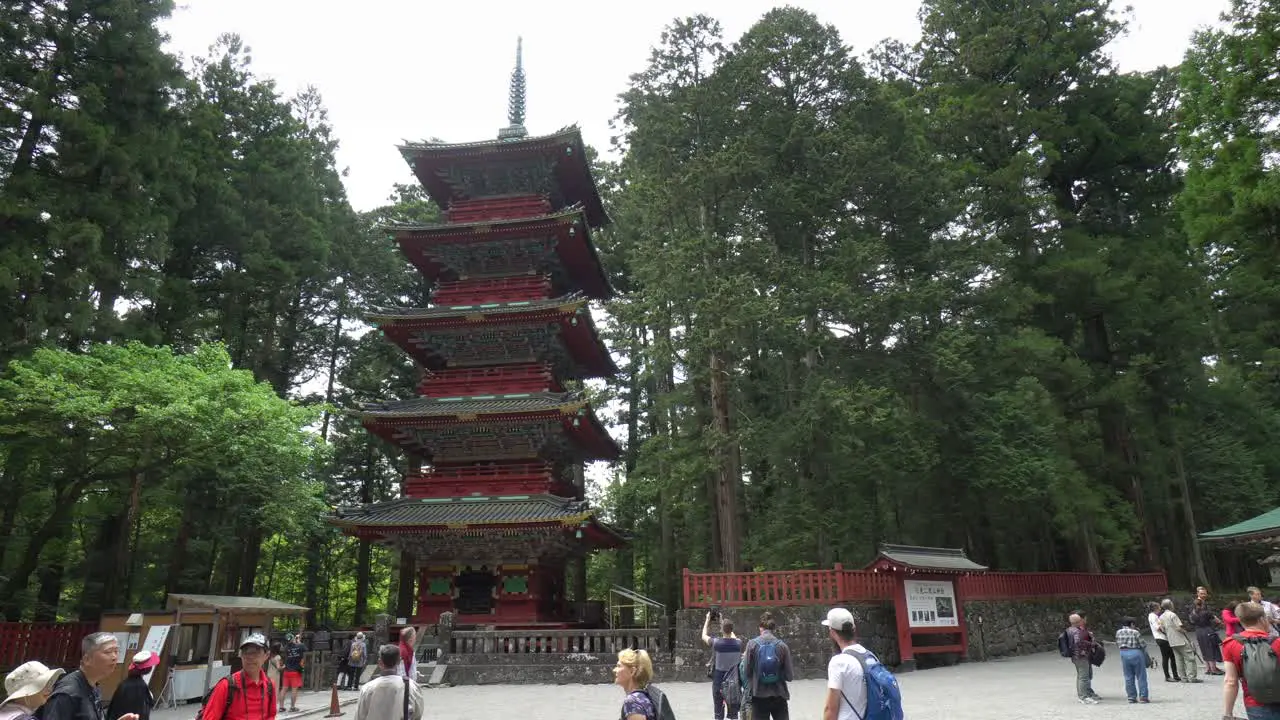 Tourists at the Gojunoto Five-Story Pagoda located in the site of Toshogu Shrine temple