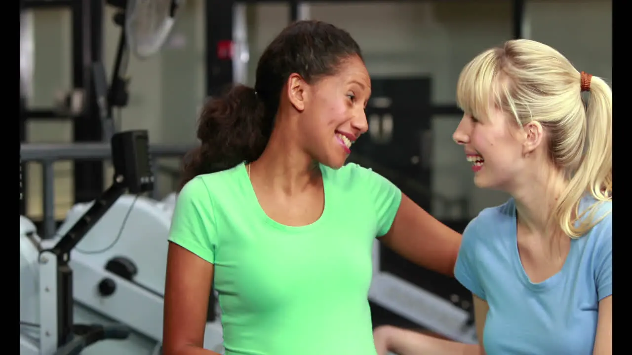 Pregnant woman working out in gym