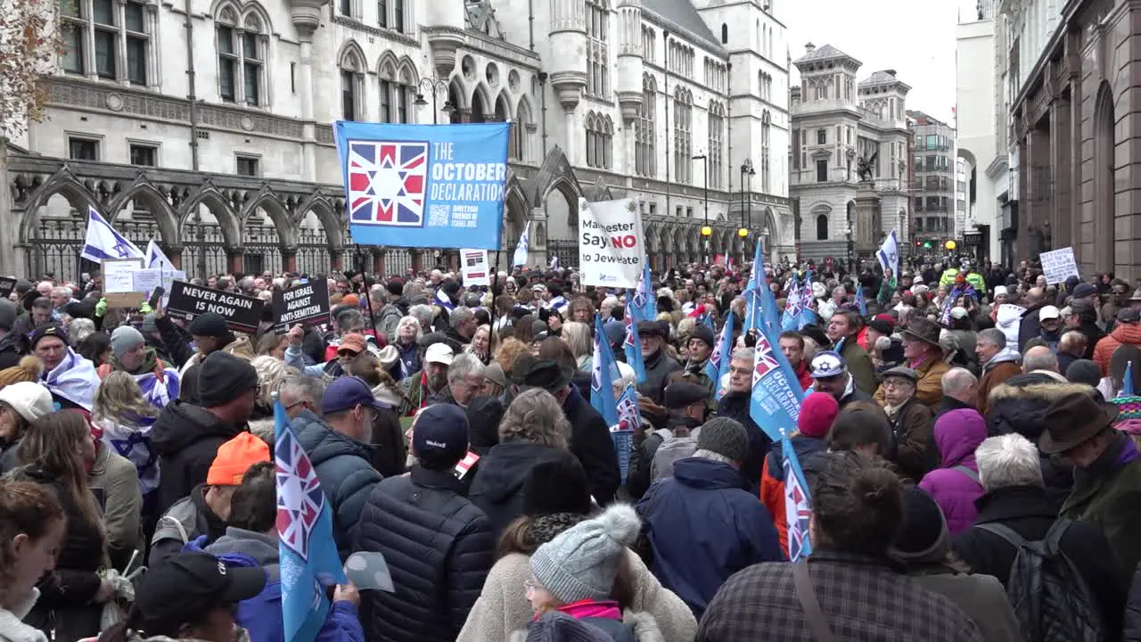 British Jews and Israel supporters gather at the Royal Courts of Justice in London for a march against antisemitism