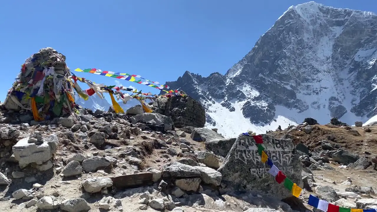 Prayer flags blowing in the wind on the trek to Everest Base Camp in the Himalaya Mountains of Nepal