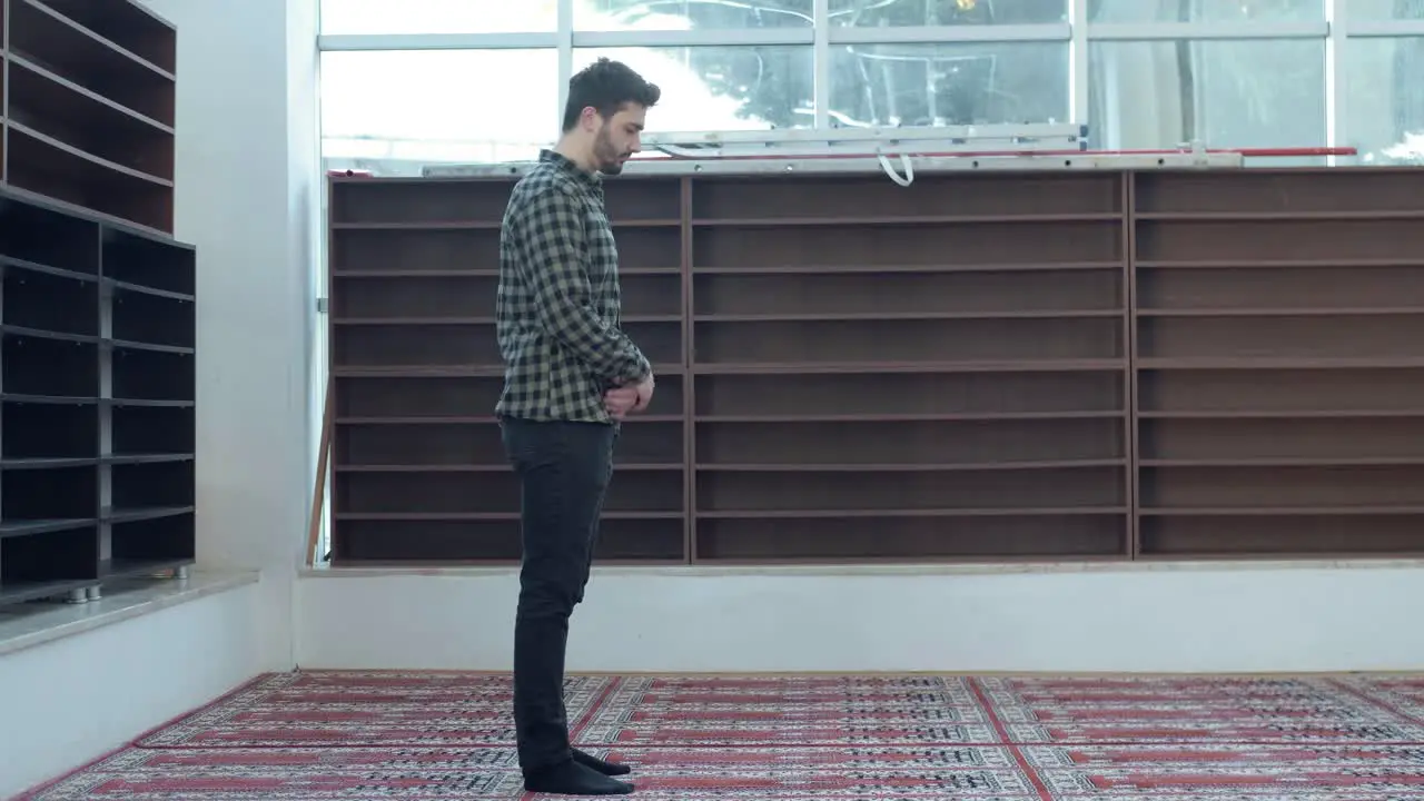 A Young Man Praying In Mosque 1